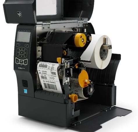 Zebra ZT400 series printer open with ribbon and label roll loaded