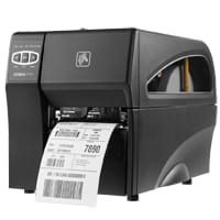 Zebra ZT220 industrial printer, front-left view with a label printing